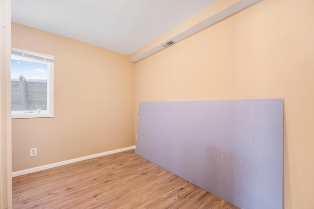 empty room featuring light hardwood / wood-style floors