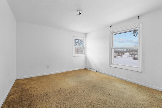 unfurnished room with carpet floors