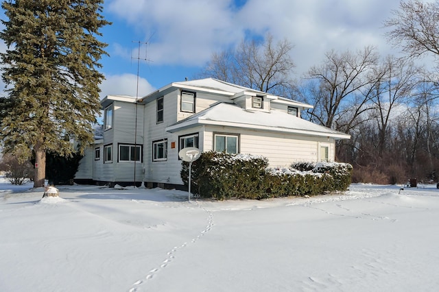 view of snow covered property