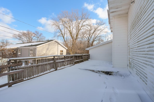 view of yard covered in snow