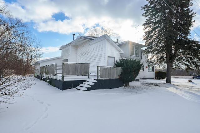 view of snow covered property