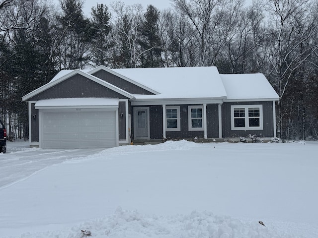 single story home with a garage