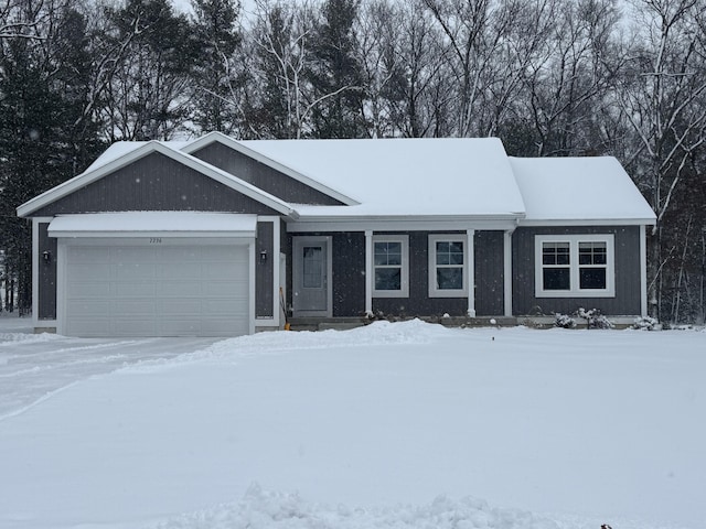 ranch-style house featuring a garage