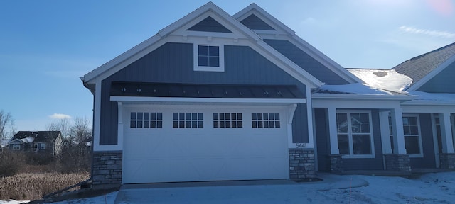 craftsman-style home featuring a garage