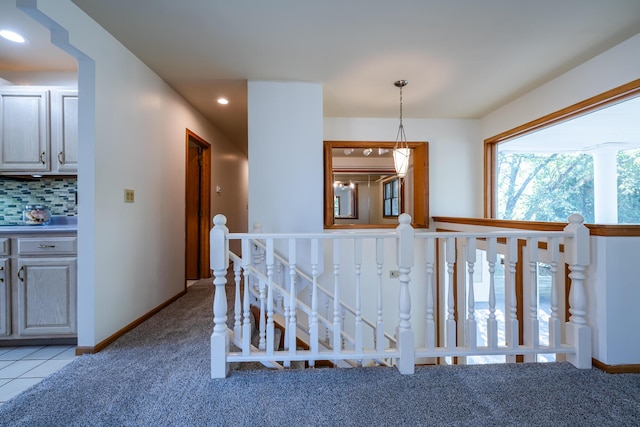 entrance foyer with light carpet