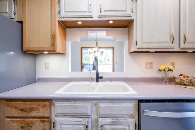 kitchen featuring stainless steel dishwasher, sink, an inviting chandelier, hanging light fixtures, and light brown cabinets