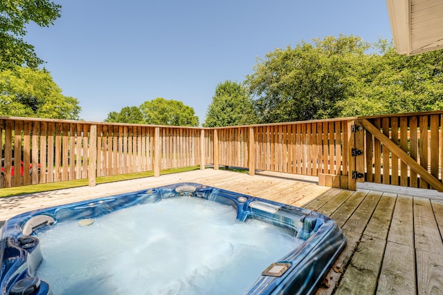 view of swimming pool featuring a deck