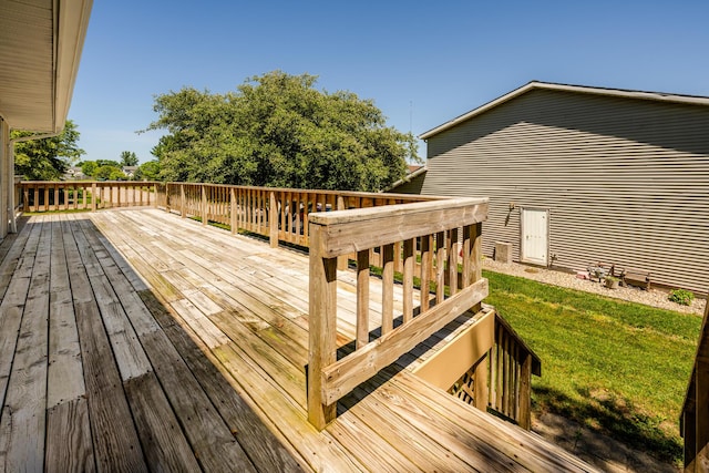 deck featuring a lawn