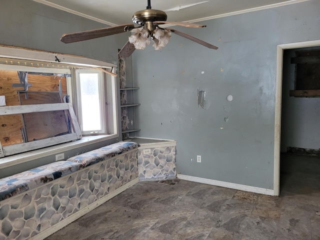 interior space with ceiling fan and crown molding