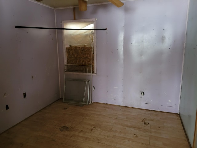 empty room with light hardwood / wood-style flooring