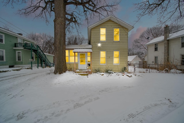 view of snow covered property