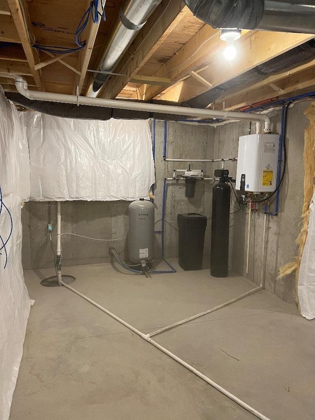 basement featuring tankless water heater