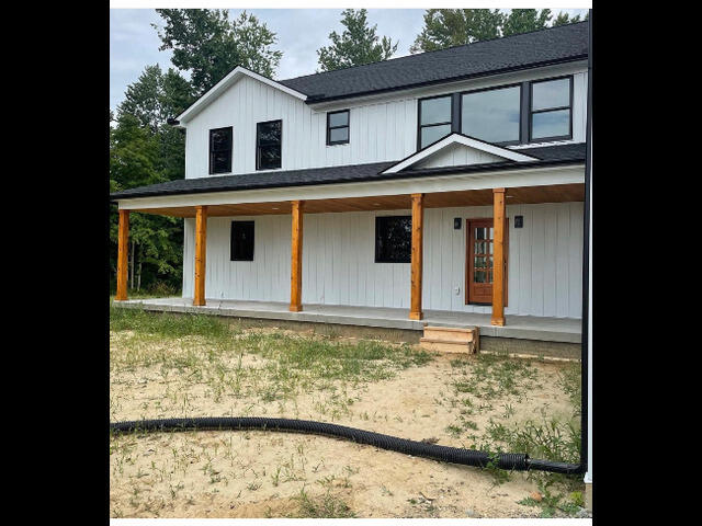 view of front of home featuring covered porch