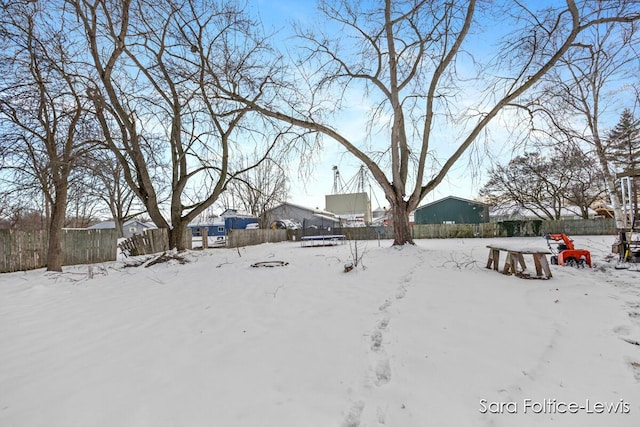 view of yard covered in snow