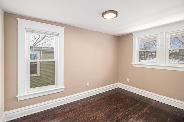 empty room with wood-type flooring