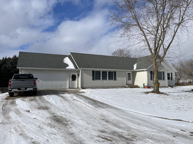 single story home with a garage