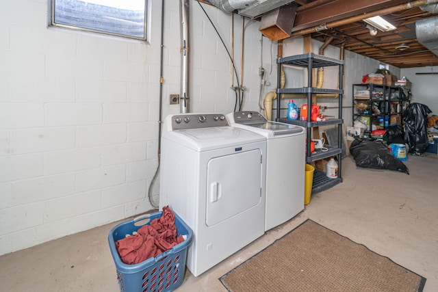 laundry room featuring washer and clothes dryer