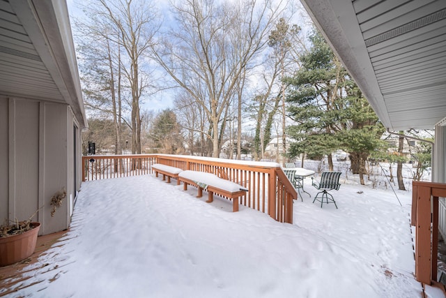 view of snow covered deck