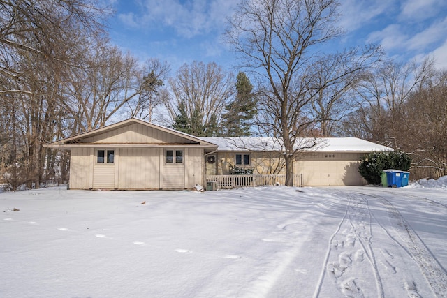 ranch-style house featuring a garage