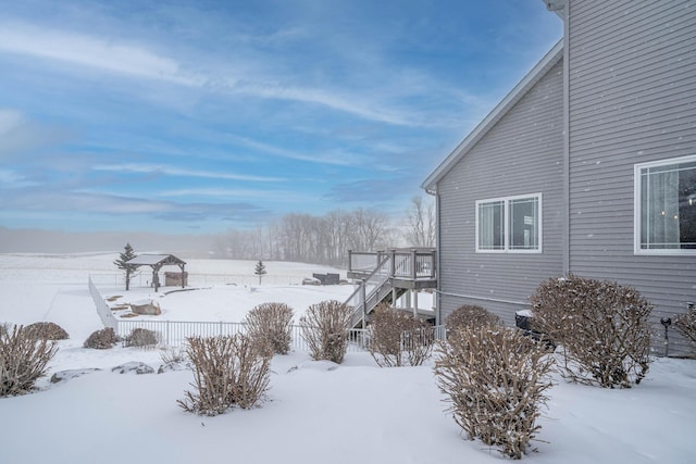 view of yard covered in snow