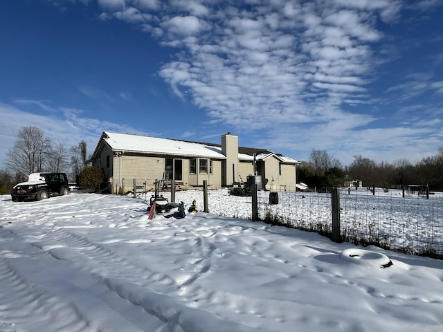 view of snow covered property