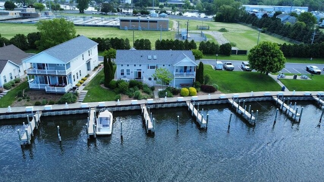 birds eye view of property featuring a water view