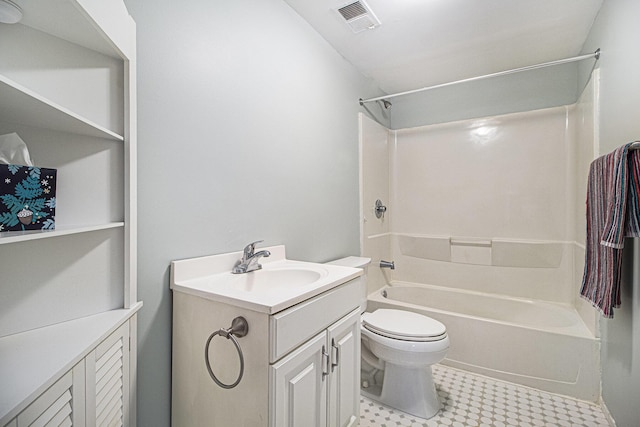 full bathroom with vanity, toilet, and  shower combination