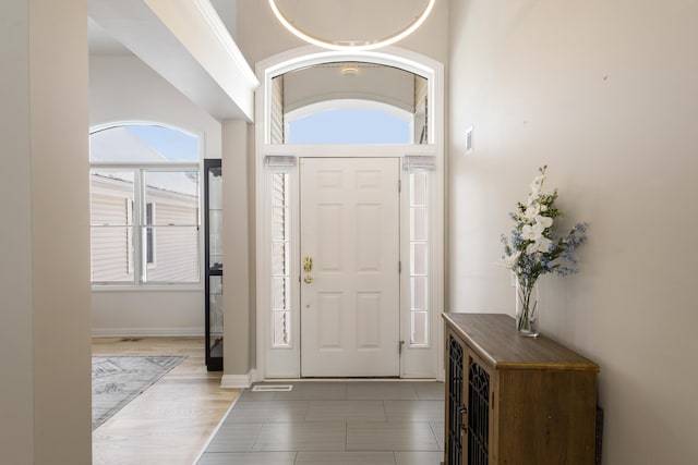 entryway featuring baseboards