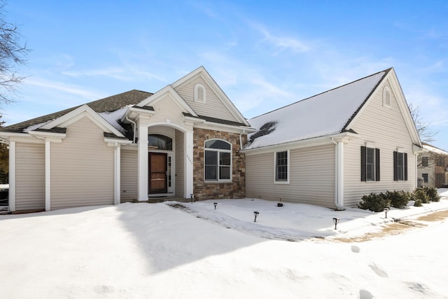 view of front of house with stone siding