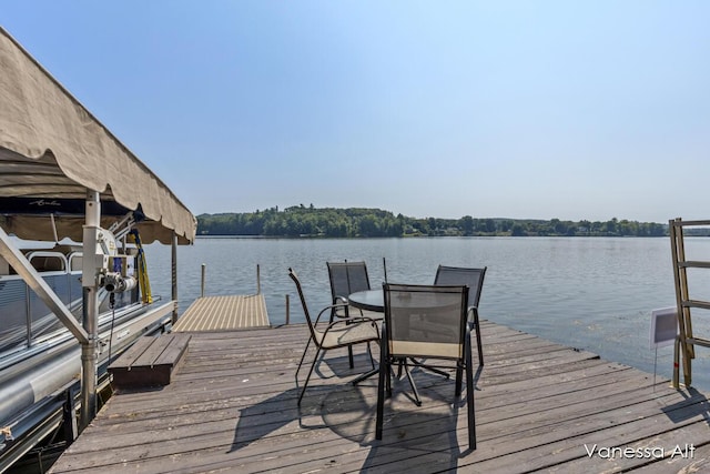 dock area featuring a water view