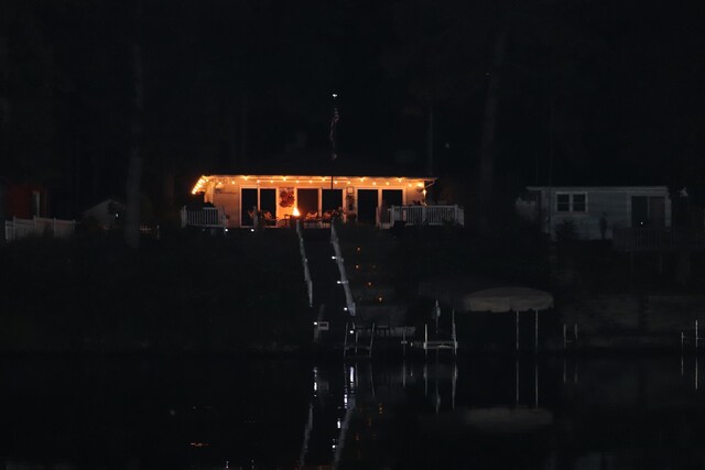 view of back house at night