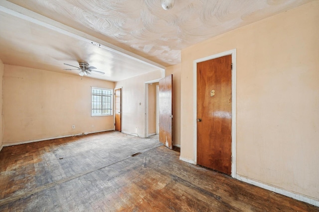 spare room with ceiling fan