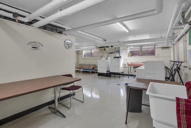interior space with washing machine and clothes dryer