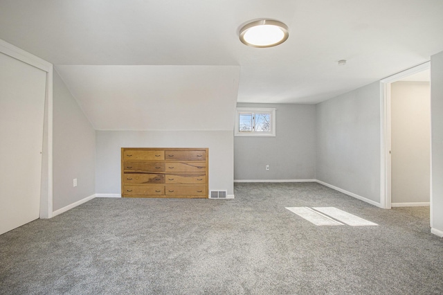 bonus room with carpet floors