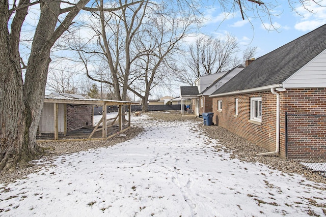 view of snowy yard