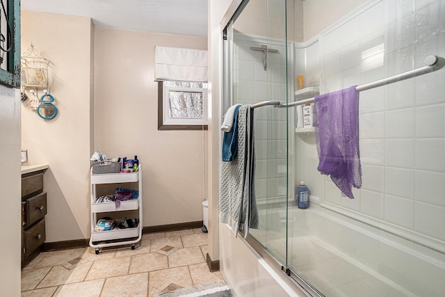 full bathroom featuring vanity, enclosed tub / shower combo, and toilet