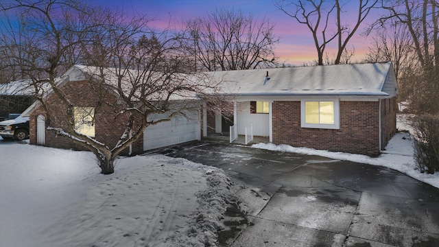 single story home featuring a garage