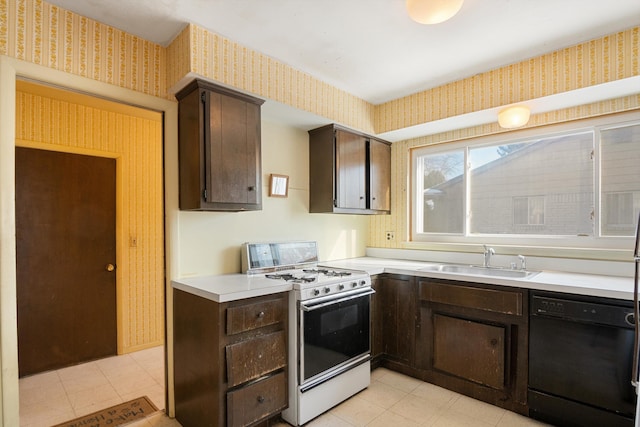 kitchen with sink, dark brown cabinets, black dishwasher, and white gas stove