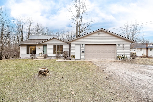 ranch-style home featuring a garage, a front lawn, and dirt driveway