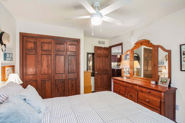 bedroom with a closet and ceiling fan