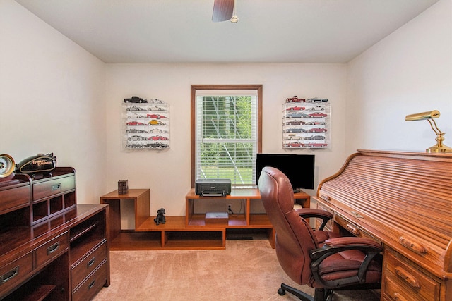 office area with light carpet and ceiling fan