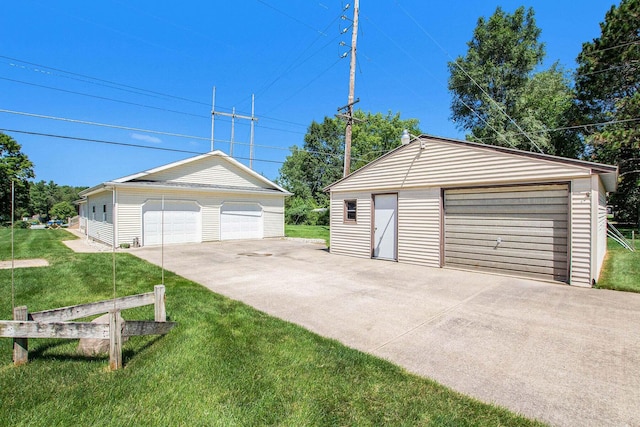 garage featuring a yard