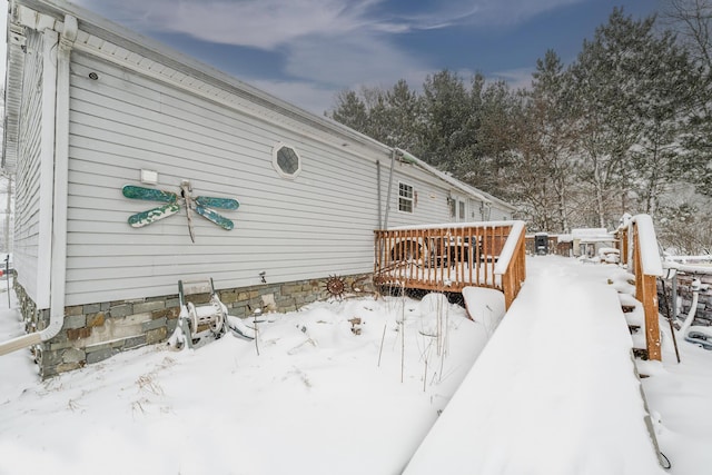 exterior space featuring a wooden deck