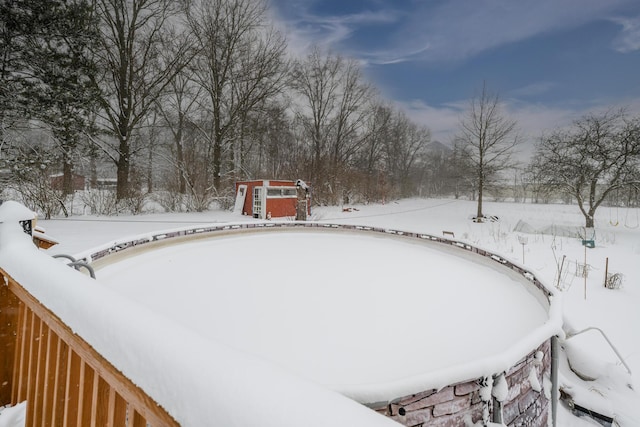 view of yard layered in snow