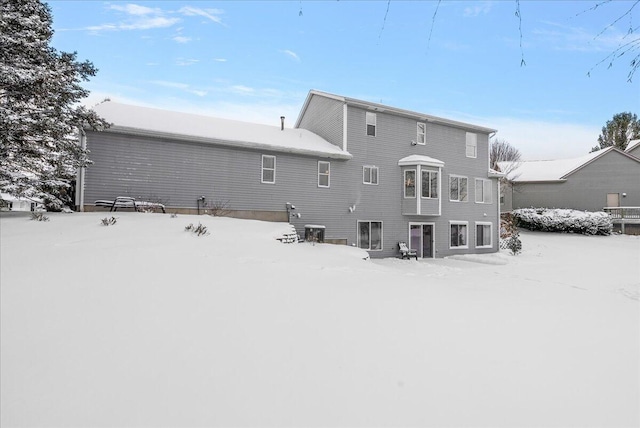 view of snow covered property