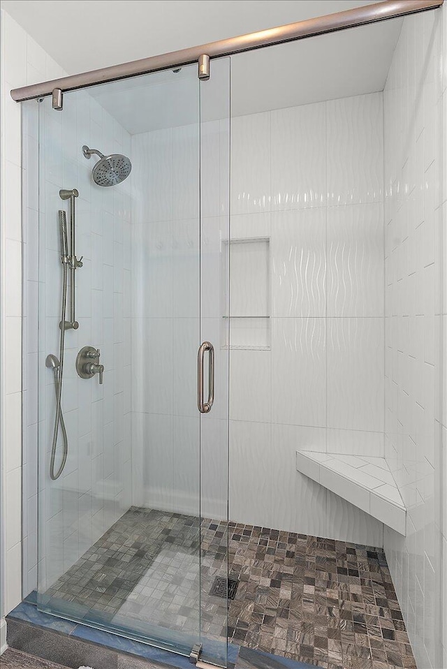 bathroom featuring walk in shower