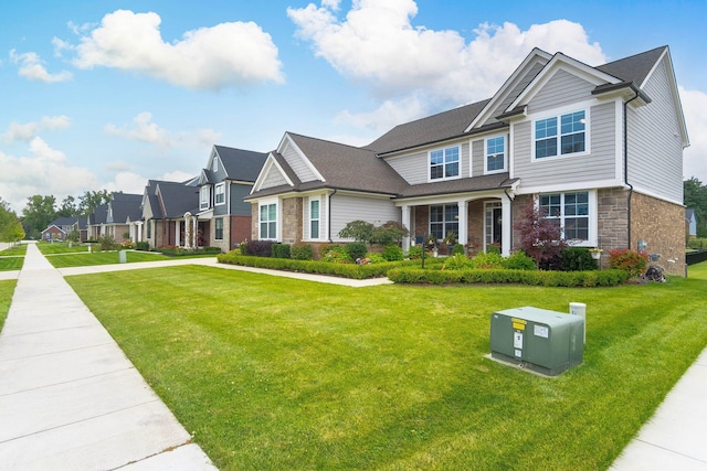 view of front of property featuring a front lawn