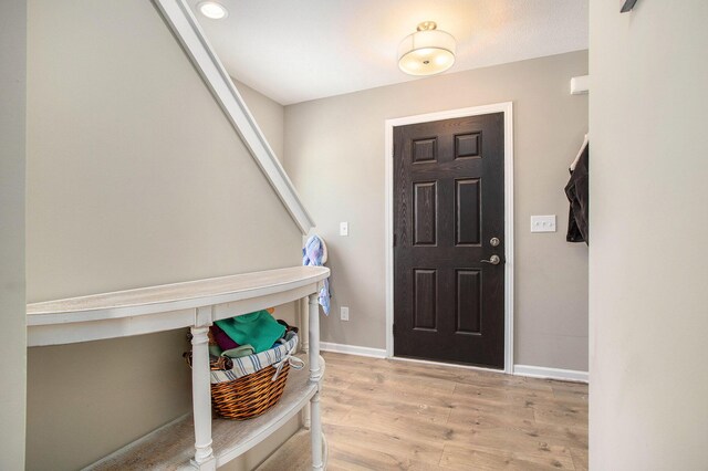 entrance foyer with light hardwood / wood-style floors