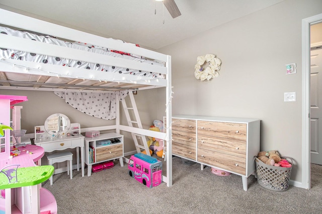 bedroom featuring ceiling fan and carpet floors