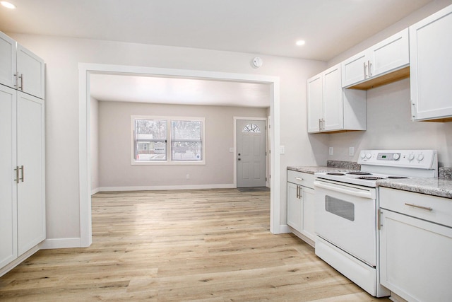 kitchen featuring white electric stove, white cabinets, and light wood-type flooring